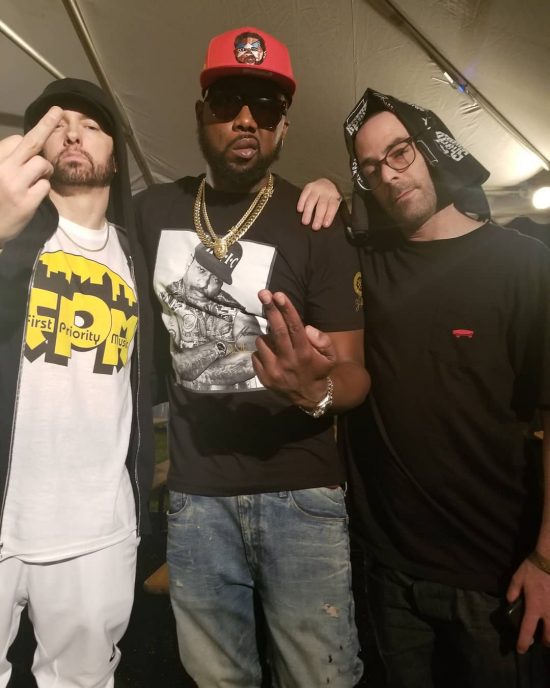 On the photo Conway is standing next to The Alchemist and Eminem, who is flipping a bird. This picture makes us think that those three have just left studio, and they are obviously happy with the results.