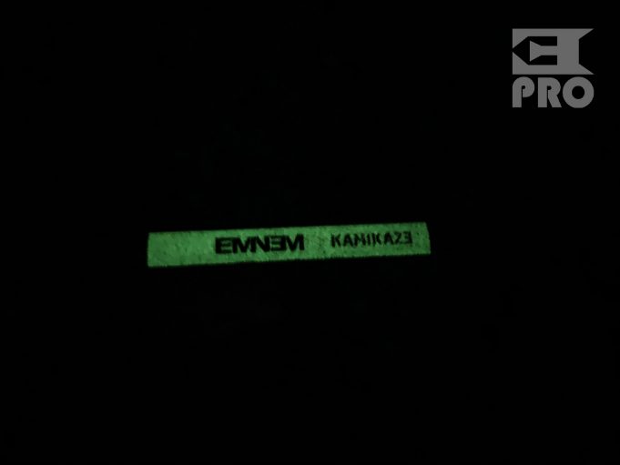 Unpacking of Kamikaze Night Combat glowing cassette with Eminem’s autograph
