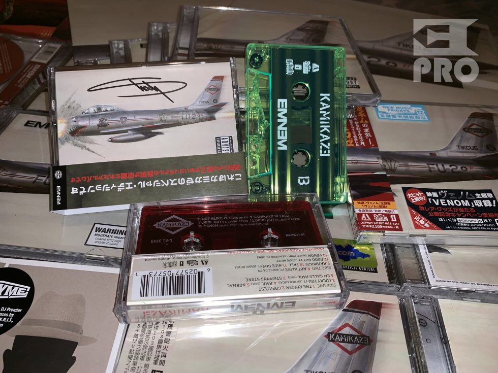Unpacking of Kamikaze Night Combat glowing cassette with Eminem’s autograph
