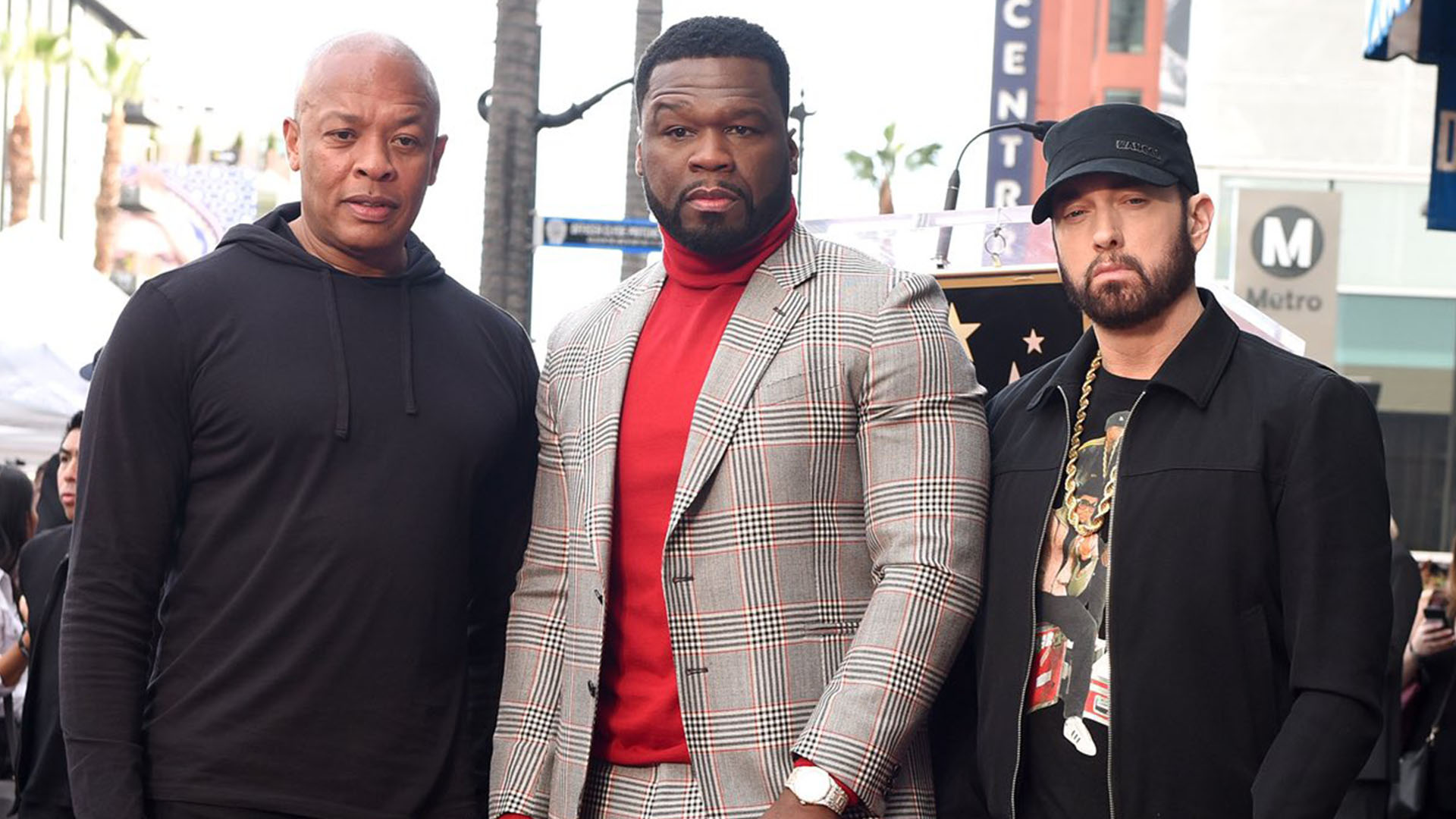 50 Cent getting his Star on the walk of fame while flanked by Dr Dre and  Eminem. Some white-hot kicks on…