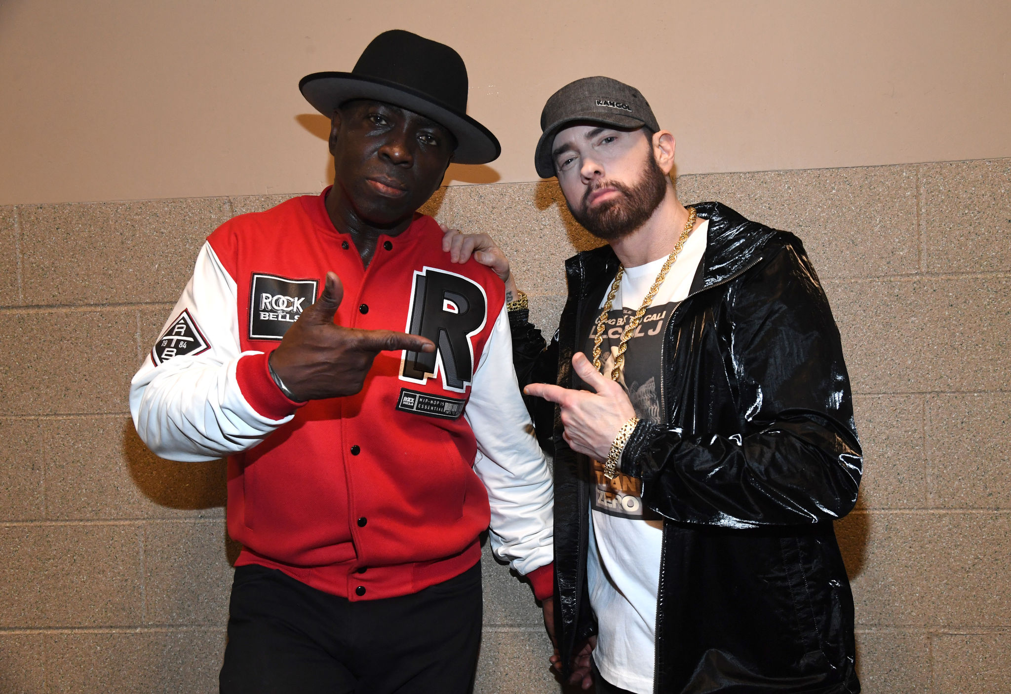 CLEVELAND, OHIO - OCTOBER 30: E-Love and Eminem pose backstage during the 36th Annual Rock & Roll Hall Of Fame Induction Ceremony at Rocket Mortgage Fieldhouse on October 30, 2021 in Cleveland, Ohio. (Photo by Kevin Mazur/Getty Images for The Rock and Roll Hall of Fame )