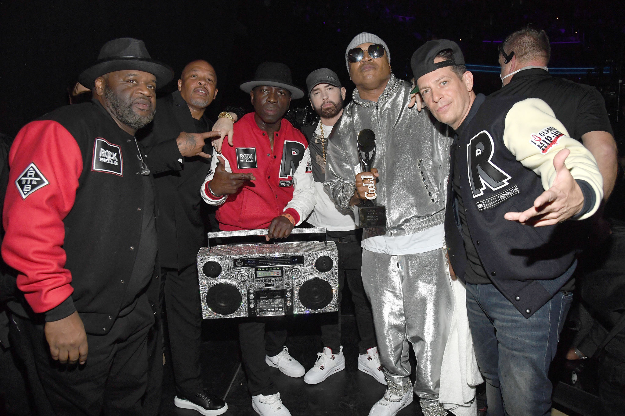 CLEVELAND, OHIO - OCTOBER 30: (L-R) DJ Cut Creator, Dr. Dre, E-Love, Eminem, LL Cool J and DJ Z-Trip pose backstage during the 36th Annual Rock & Roll Hall Of Fame Induction Ceremony at Rocket Mortgage Fieldhouse on October 30, 2021 in Cleveland, Ohio. (Photo by Kevin Mazur/Getty Images for The Rock and Roll Hall of Fame )