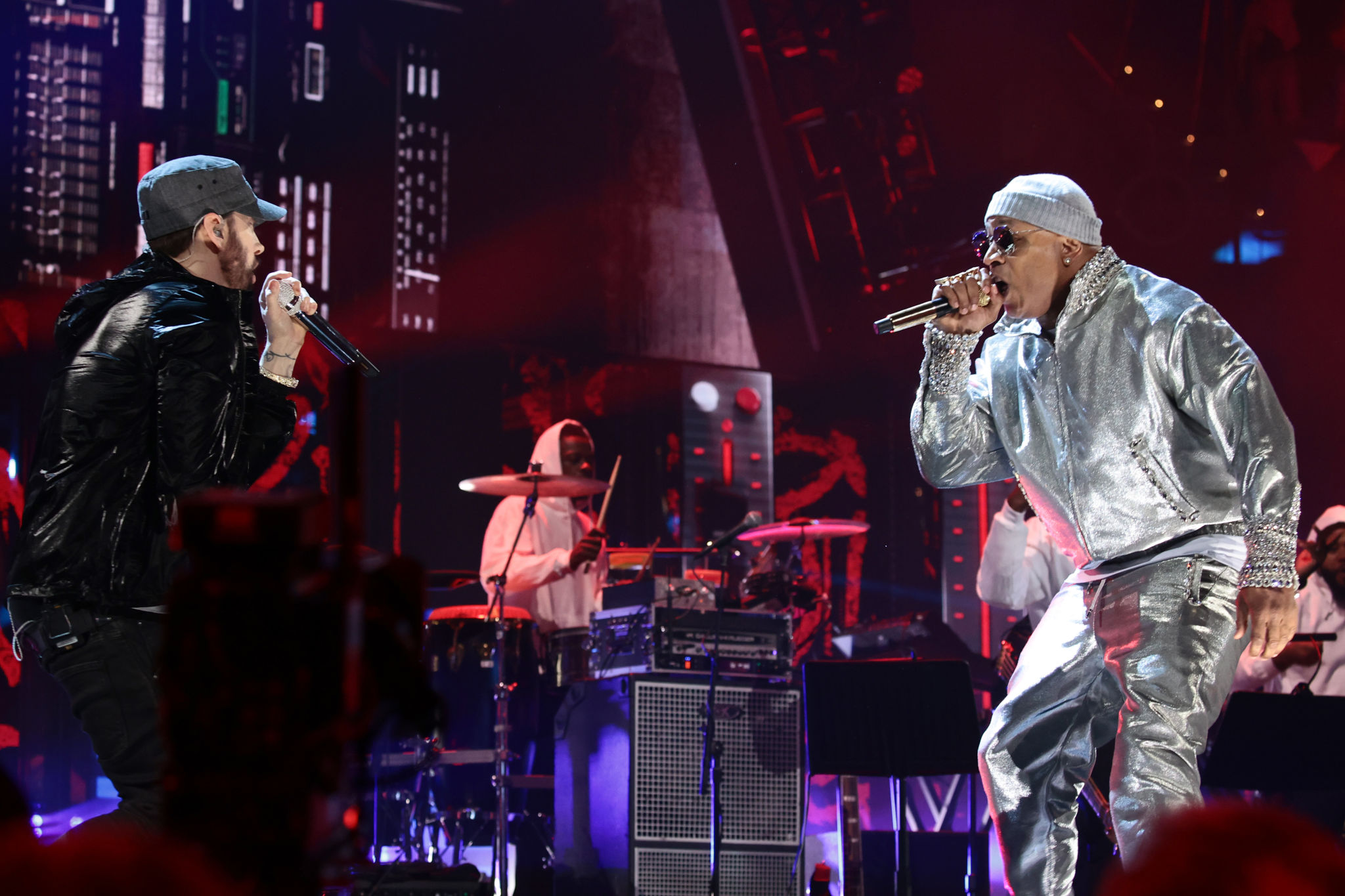 CLEVELAND, OHIO - OCTOBER 30: Eminem and LL Cool J perform onstage during the 36th Annual Rock & Roll Hall Of Fame Induction Ceremony at Rocket Mortgage Fieldhouse on October 30, 2021 in Cleveland, Ohio. (Photo by Dimitrios Kambouris/Getty Images for The Rock and Roll Hall of Fame )