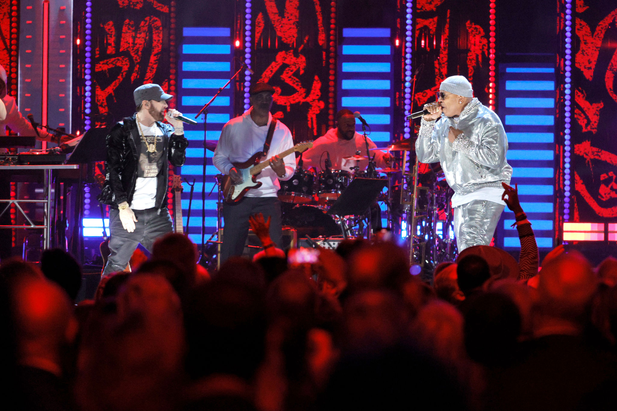 CLEVELAND, OHIO - OCTOBER 30: Eminem (L) and LL Cool J perform onstage during the 36th Annual Rock & Roll Hall Of Fame Induction Ceremony at Rocket Mortgage Fieldhouse on October 30, 2021 in Cleveland, Ohio. (Photo by Michael Loccisano/Getty Images for The Rock and Roll Hall of Fame )