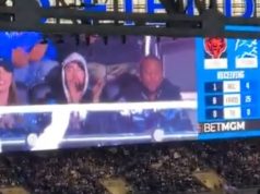 Eminem, Hailie Jade, and Mr. Porter Cheer on the Detroit Lions at Thanksgiving Game